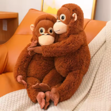 Peluche orangután que Abraza