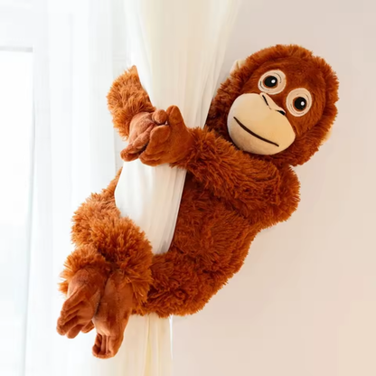 Peluche orangután que Abraza