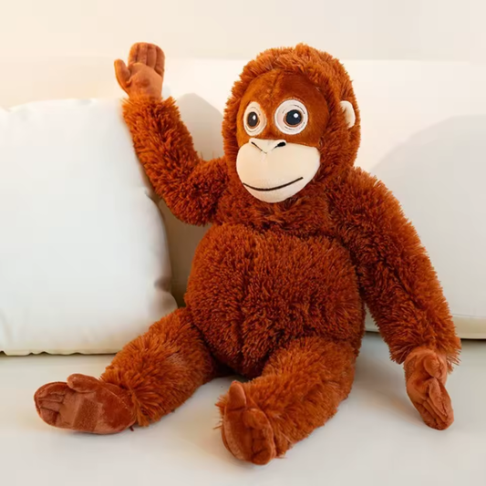 Peluche orangután que Abraza